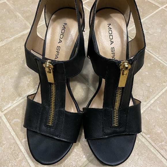 Black high heels.